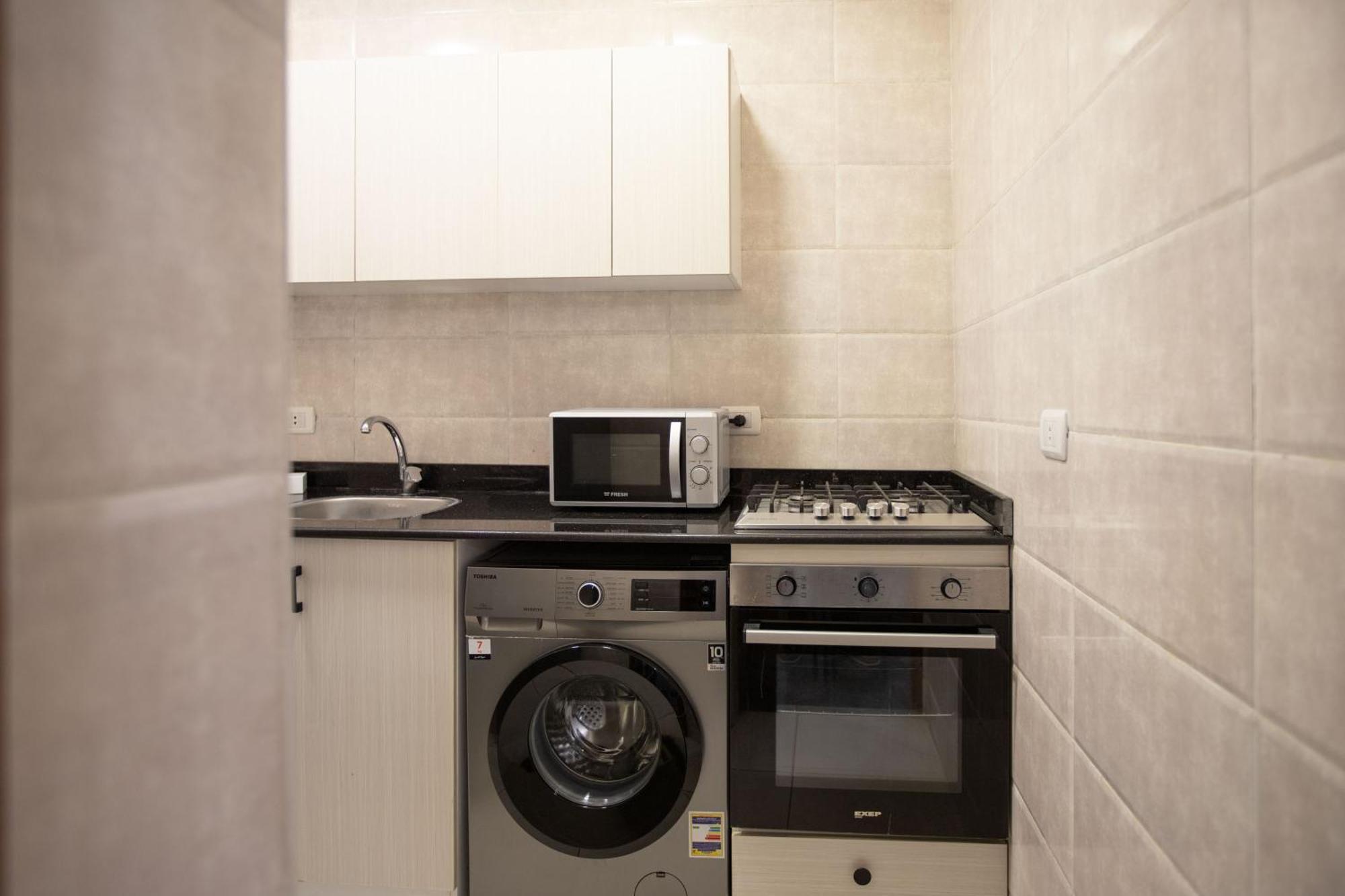 Apartment Travelholic Auc